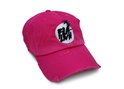 Damaged pink dad hat with black and white logo