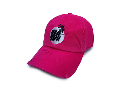 Damaged pink dad hat with black and white logo