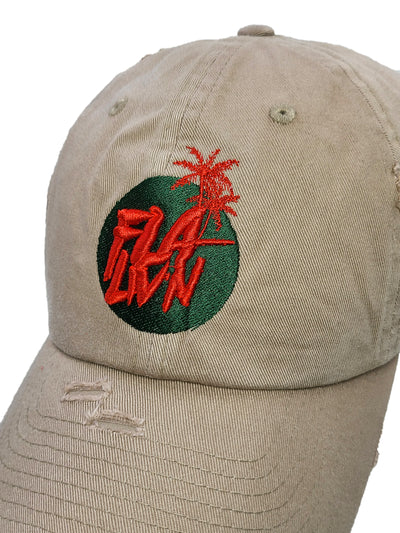 Damaged Khaki dad hat with green and red logo.